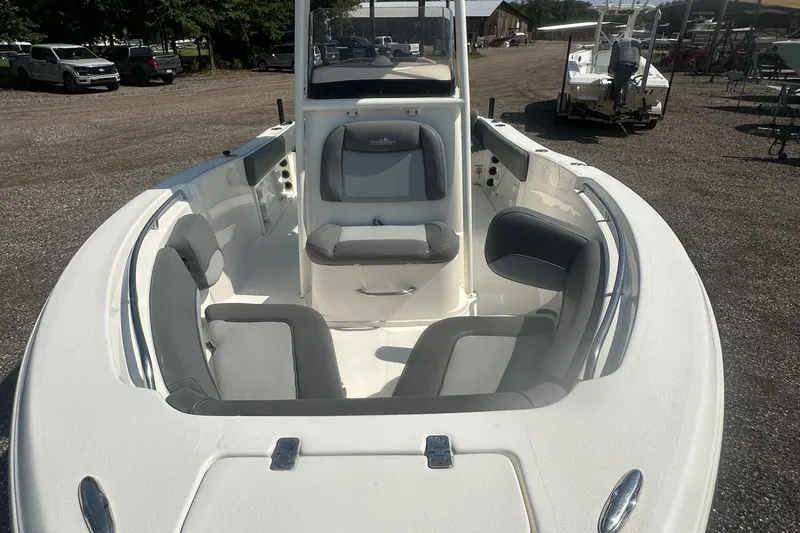 Slide: The Image of 2023 NauticStar 2102 Legacy boat with spacious seating and sleek design. - 7