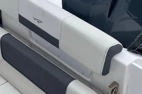 Slide: The Image of 2020 Tidewater 220 CC boat seating detail with sleek design and modern upholstery. - 8