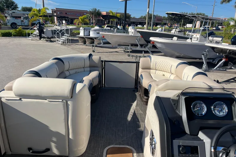 Slide: The Image of 2026 Avalon 2385 Catalina Quad Lounger, Tri Toon High Performance boat interior with plush seating. - 14