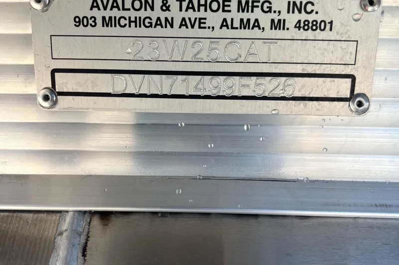 Slide: The Image of Metal identification plate on Avalon 2385 Catalina Quad Lounger, Tri Toon High Performance, 2026 model. - 24