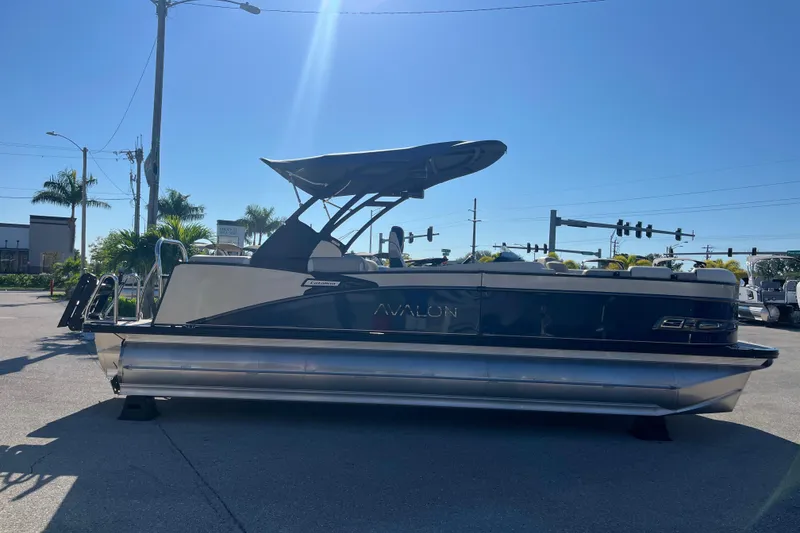Slide: The Image of 2026 Avalon 2385 Catalina Quad Lounger Tri Toon boat in outdoor setting. - 4