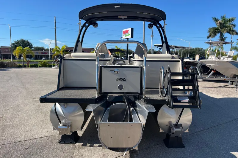 Slide: The Image of 2026 Avalon 2385 Catalina Quad Lounger Tri Toon, rear view in outdoor setting. - 6