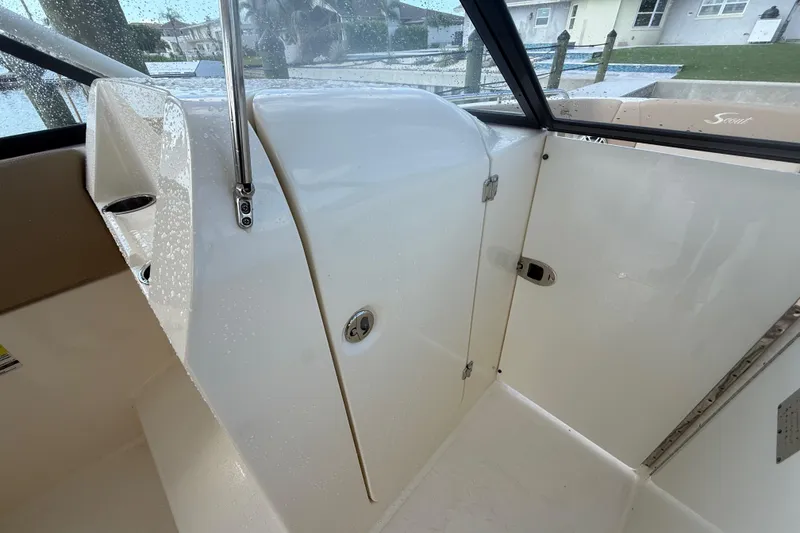 Slide: The Image of 2023 Scout 255 Dorado boat interior with wet surfaces and sleek design. - 40