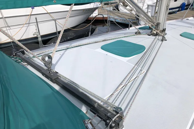 Slide: The Image of Deck of 1996 Catalina 36 MkII sailboat with rigging and teal accents. - 9