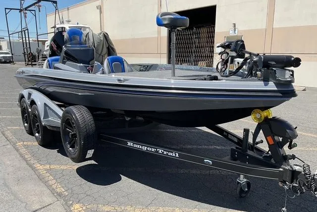 Slide: The Image of 2026 Ranger Z518 boat on trailer, parked outdoors, featuring sleek design and modern equipment. - 3