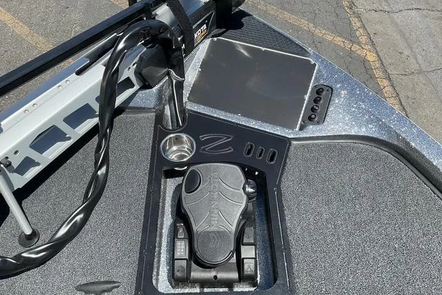 Slide: The Image of 2026 Ranger Z518 boat dashboard with control panel and foot pedal. - 8