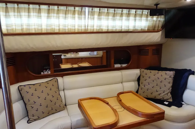 Slide: The Image of Luxurious interior of 2007 Chris-Craft Roamer 40 yacht with elegant seating and nautical decor. - 13