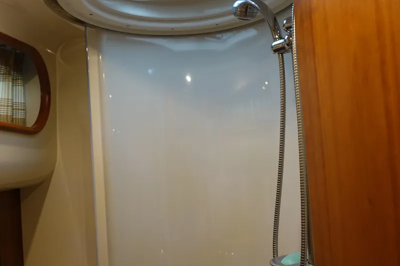 Slide: The Image of Shower area inside 2007 Chris-Craft Roamer 40 yacht, featuring sleek design and modern fixtures. - 23