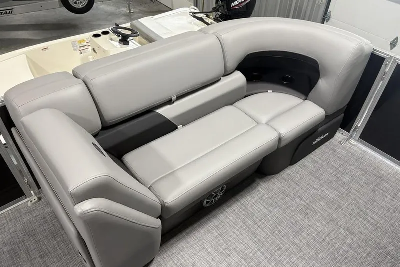 Slide: The Image of 2026 Sun Tracker PARTY BARGE® 22 XP3 interior with plush gray seating and modern design. - 10