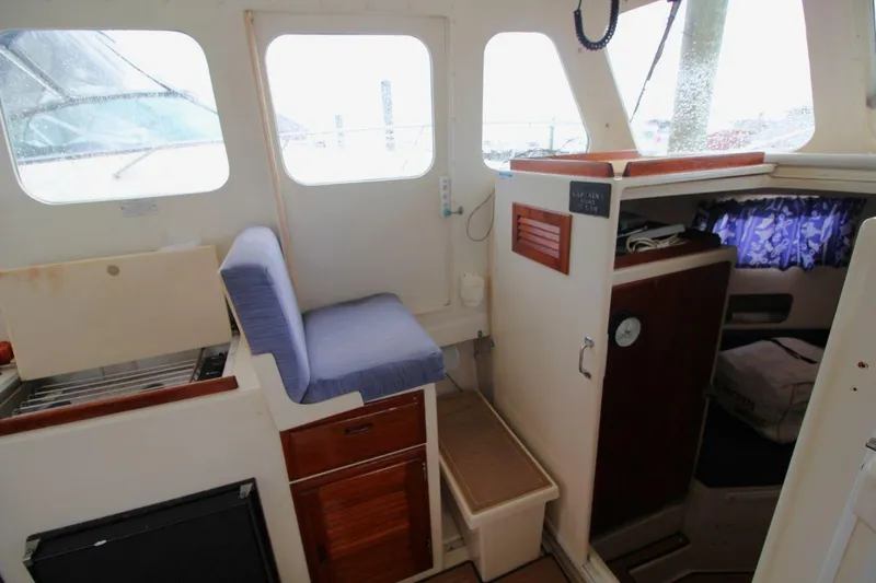 Slide: The Image of Interior of 2002 Rosborough RF-246 Sedan Cruiser with seating and cabin area. - 17