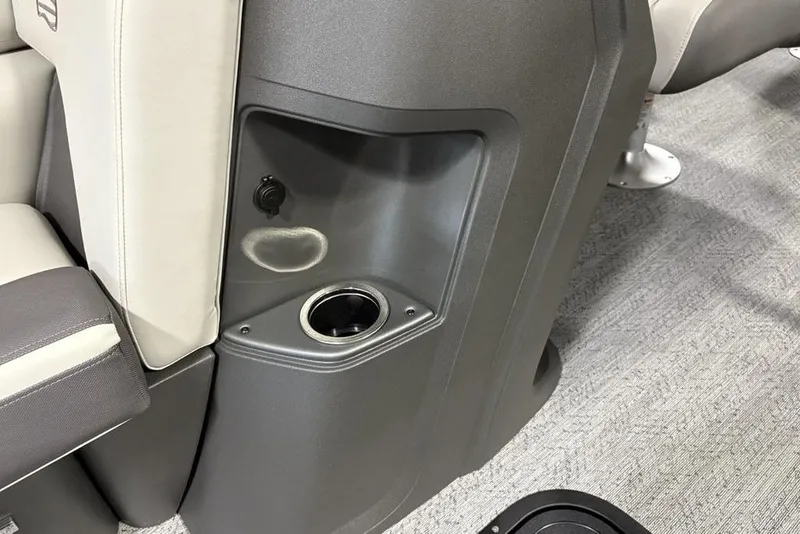 Slide: The Image of Interior of 2026 Sun Tracker Fishin' Barge 22 XP3 with cup holder and seating. - 21