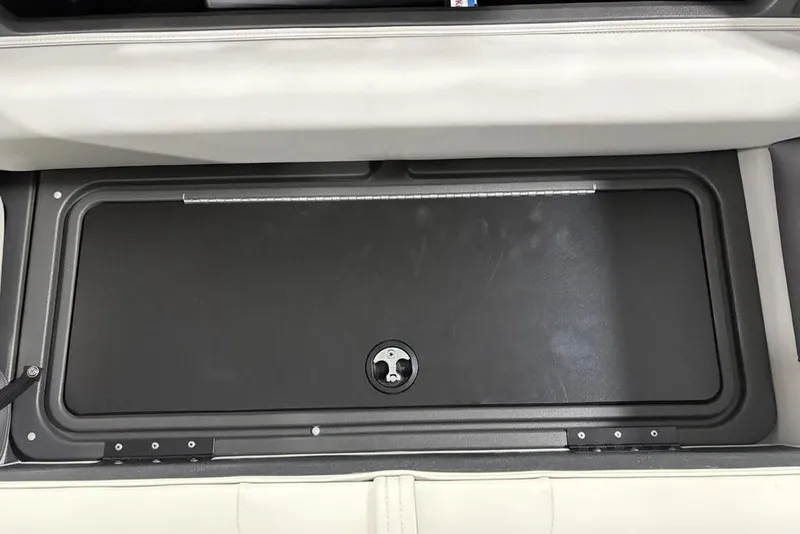 Slide: The Image of Storage compartment of 2026 Sun Tracker Fishin' Barge 22 XP3 boat. - 28