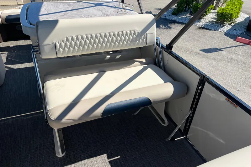 Slide: The Image of 2026 Avalon 2785 Catalina boat interior with cushioned seating and modern design. - 19