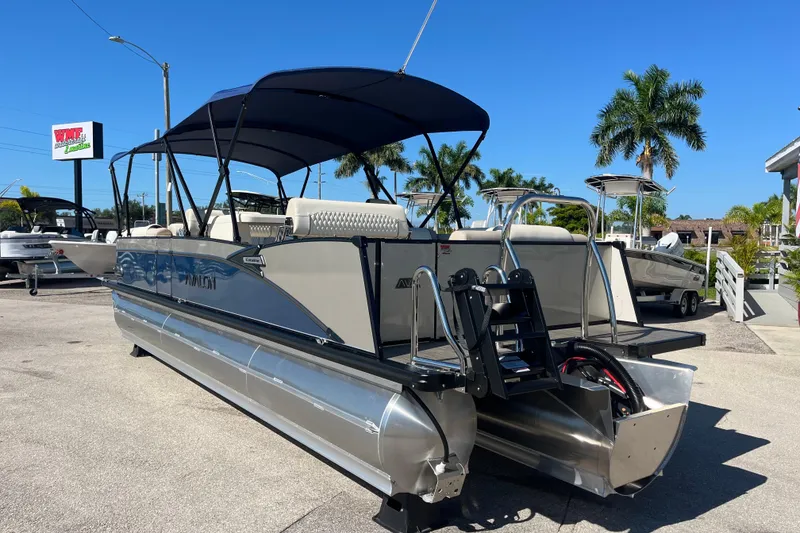 Slide: The Image of 2026 Avalon 2785 Catalina Bar Tri Toon with Mercury 400hp V-10, parked outdoors. - 7