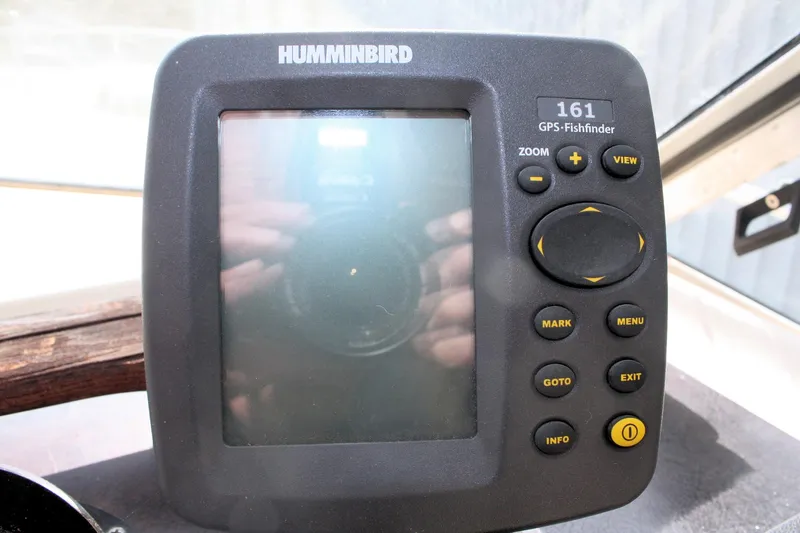Slide: The Image of Humminbird 161 GPS Fishfinder on 1980 Sea Ray 300 Weekender boat dashboard. - 23