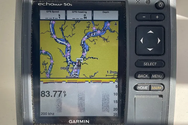 Slide: The Image of Garmin echomap 50s displaying nautical map and temperature on Scout 242 Sportfish, 2006 model. - 21
