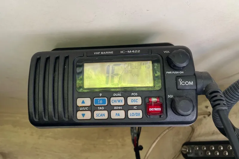 Slide: The Image of VHF marine radio IC-M422 on 2006 Scout 242 Sportfish boat. - 23