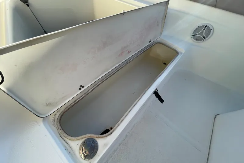 Slide: The Image of Open storage compartment on a 2006 Scout 242 Sportfish boat. - 41