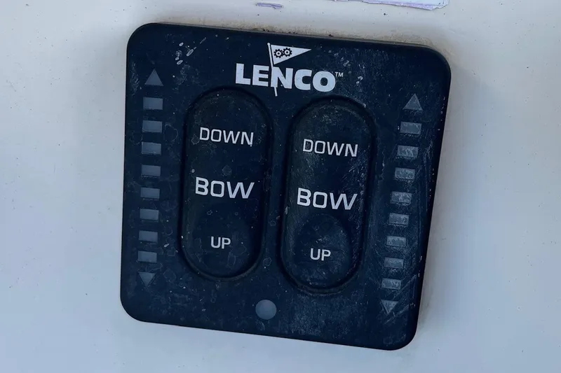 Slide: The Image of Lenco trim tab control panel on 2006 Scout 242 Sportfish boat. - 45