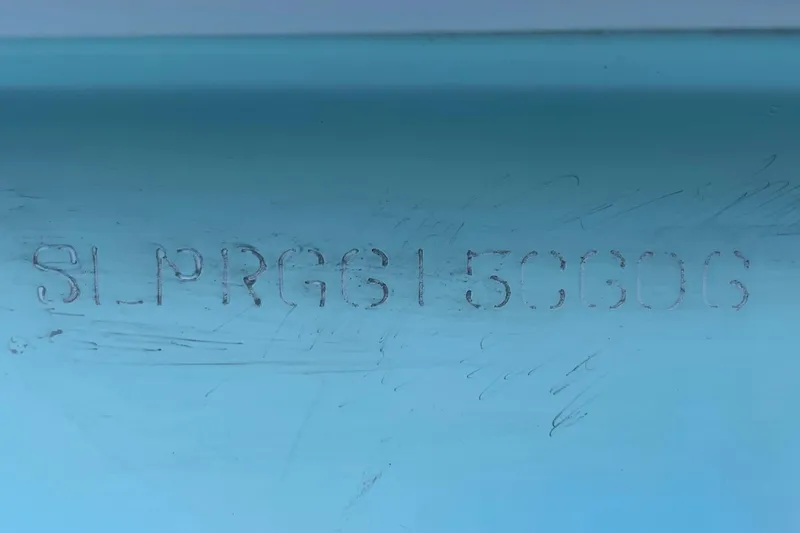 Slide: The Image of Hull identification number on a 2006 Scout 242 Sportfish boat. - 57