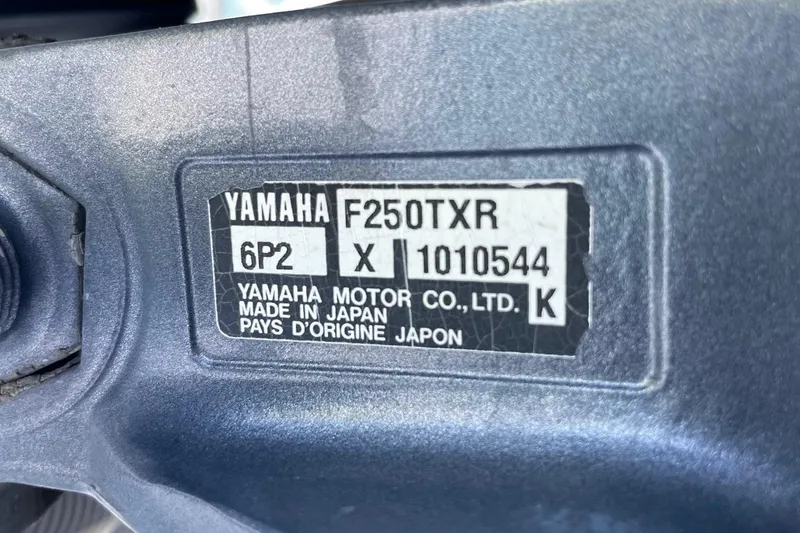 Slide: The Image of Yamaha F250TXR engine label on a 2006 Scout 242 Sportfish boat. - 58