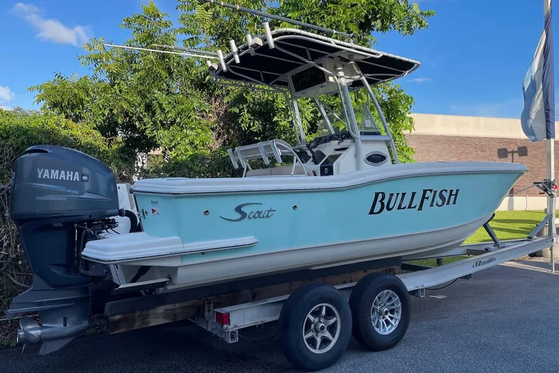 Slide: The Image of 2006 Scout 242 Sportfish boat on trailer with Yamaha engine, labeled "BullFish." - 8
