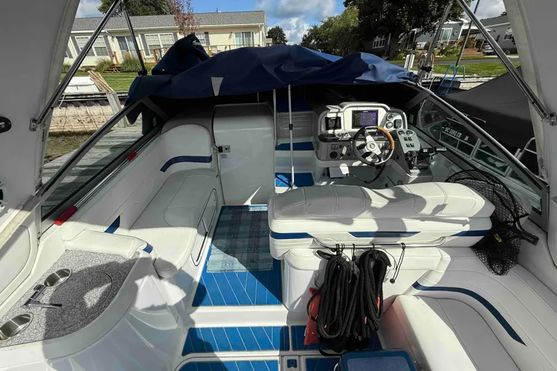 Slide: The Image of 2007 Formula 27 Performance Cruiser interior with helm, seating, and nautical equipment. - 10