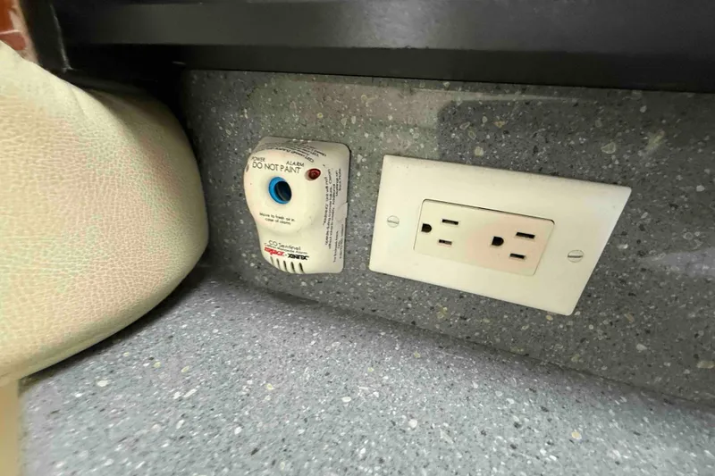 Slide: The Image of 2007 Formula 27 Performance Cruiser interior with CO detector and power outlet. - 32