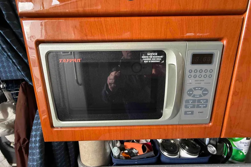 Slide: The Image of Tappan microwave in 2007 Formula 27 Performance Cruiser's wooden interior. - 35