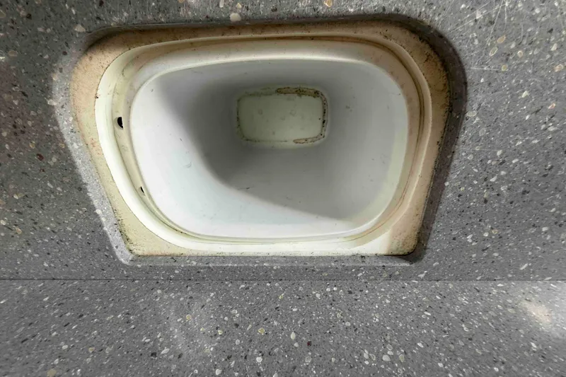 Slide: The Image of Storage compartment in 2007 Formula 27 Performance Cruiser boat, featuring a speckled surface. - 43