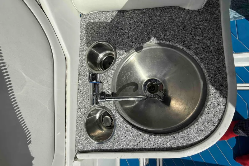 Slide: The Image of Stainless steel sink on 2007 Formula 27 Performance Cruiser boat with granite countertop. - 48