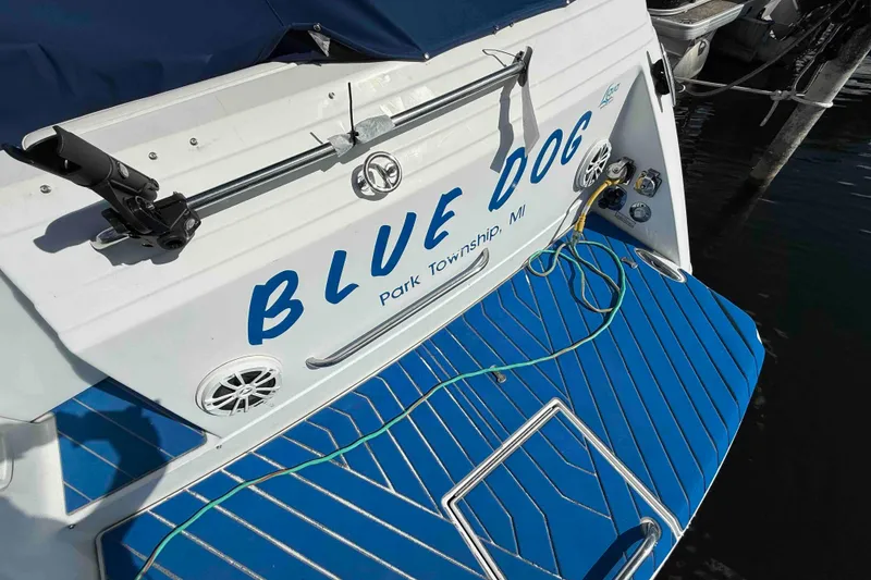 Slide: The Image of 2007 Formula 27 Performance Cruiser named "Blue Dog" docked in Park Township, MI. - 54