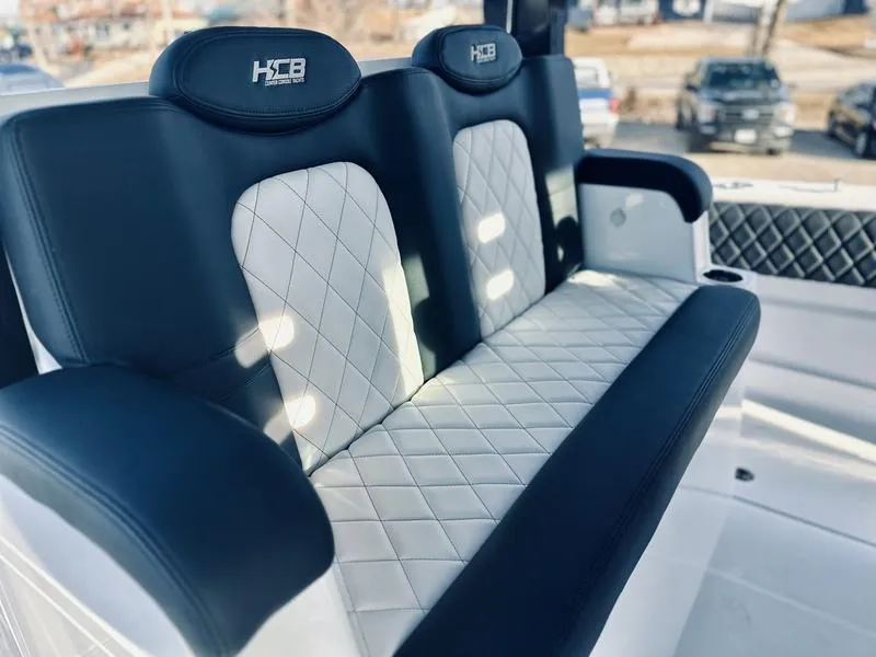 Slide: The Image of Luxurious seating on the 2024 HCB 42 Lujo boat with diamond-stitched upholstery. - 15