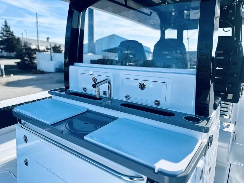 Slide: The Image of 2024 HCB 42 Lujo boat interior with sink and storage compartments. - 16