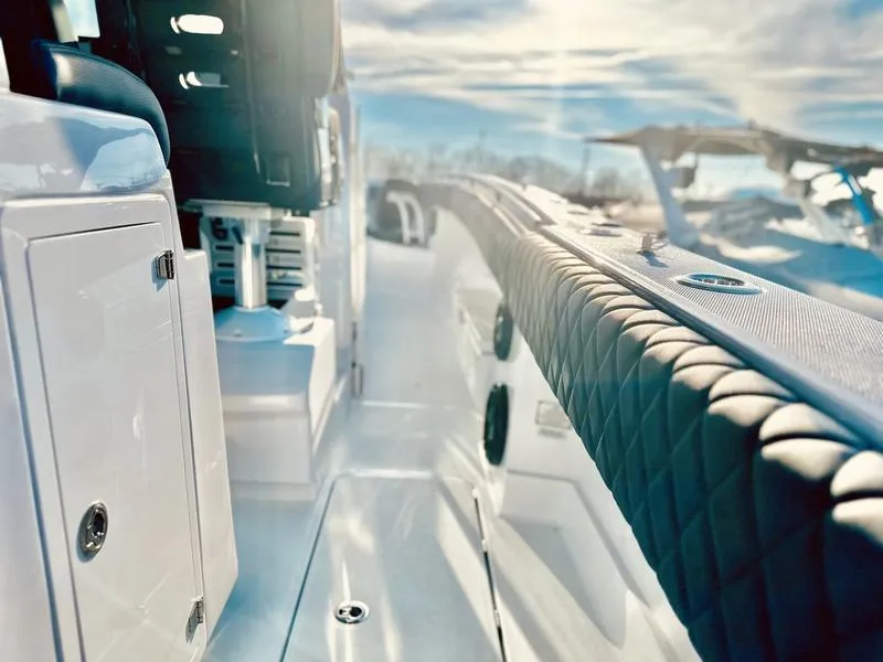 Slide: The Image of 2024 HCB 42 Lujo boat interior with luxurious seating and modern design. - 17