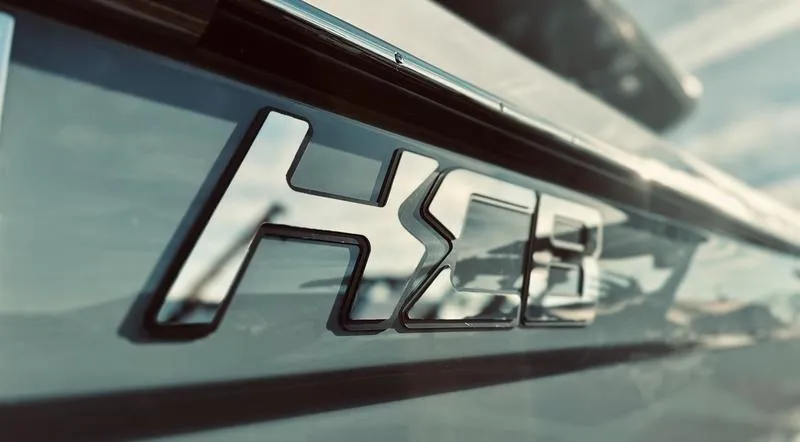 Slide: The Image of Close-up of HCB logo on 2024 HCB 42 Lujo boat. - 21