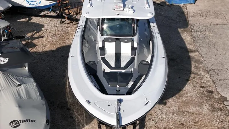 Slide: The Image of 2024 HCB 42 Lujo boat docked on land, top view. - 5
