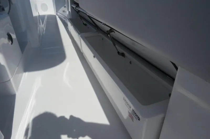 Slide: The Image of 2024 HCB 53 FT Suenos boat interior with storage compartment. - 12