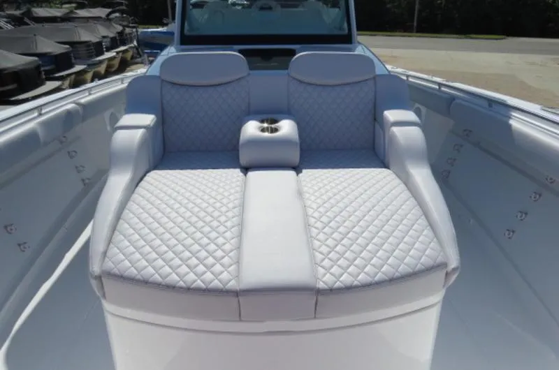 Slide: The Image of Luxurious seating on 2024 HCB 53 FT Suenos boat with quilted upholstery. - 23