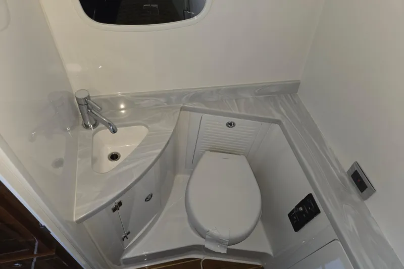 Slide: The Image of 2024 HCB 53 FT Suenos yacht bathroom with modern sink and toilet. - 36