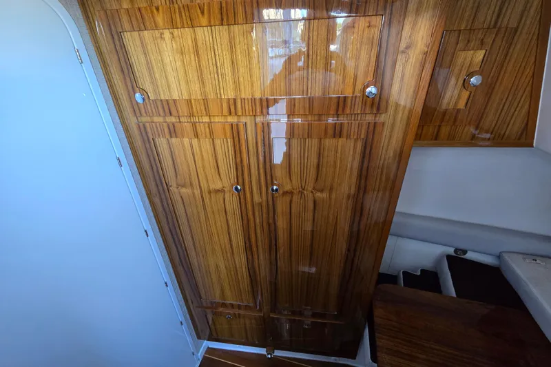 Slide: The Image of Luxurious wooden cabinetry inside 2024 HCB 53 FT Suenos boat interior. - 41