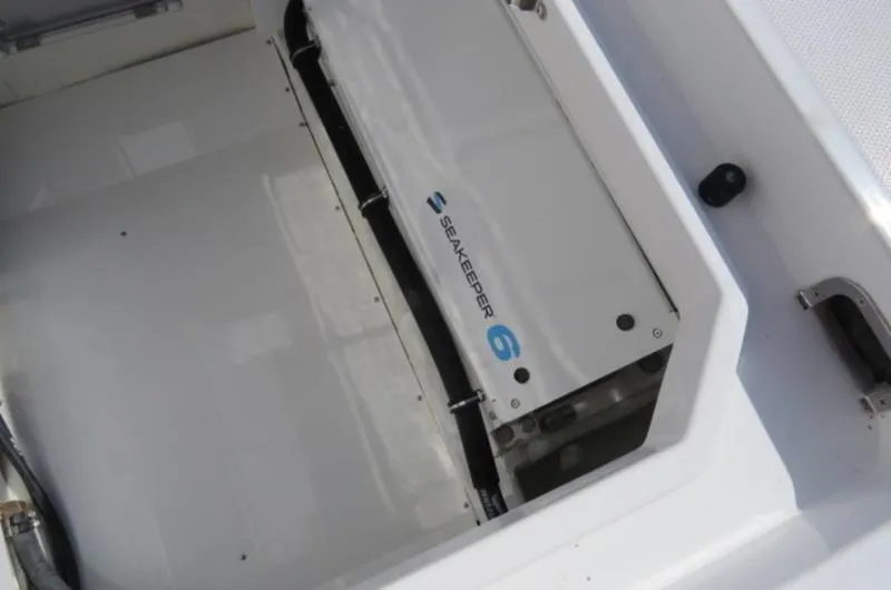 Slide: The Image of 2024 HCB 53 FT Suenos featuring Seakeeper 6 stabilizer system in white compartment. - 5