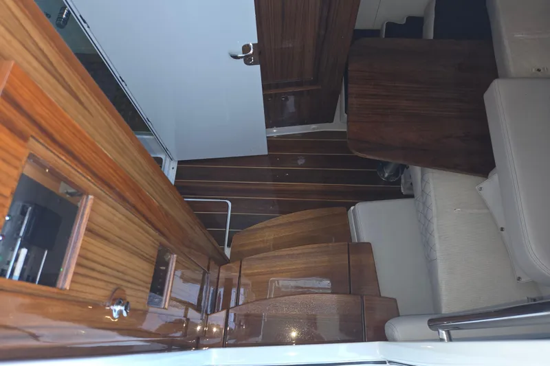 Slide: The Image of Luxurious interior of 2024 HCB 53 FT Suenos yacht with wooden finishes. - 72