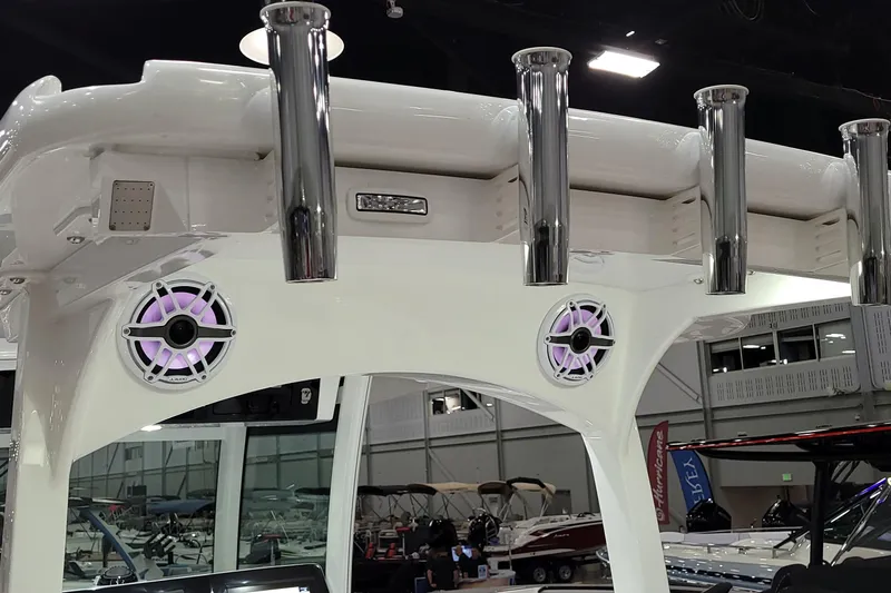 Slide: The Image of 2023 HCB 39 FT Speciale boat with speakers and rod holders on display. - 10