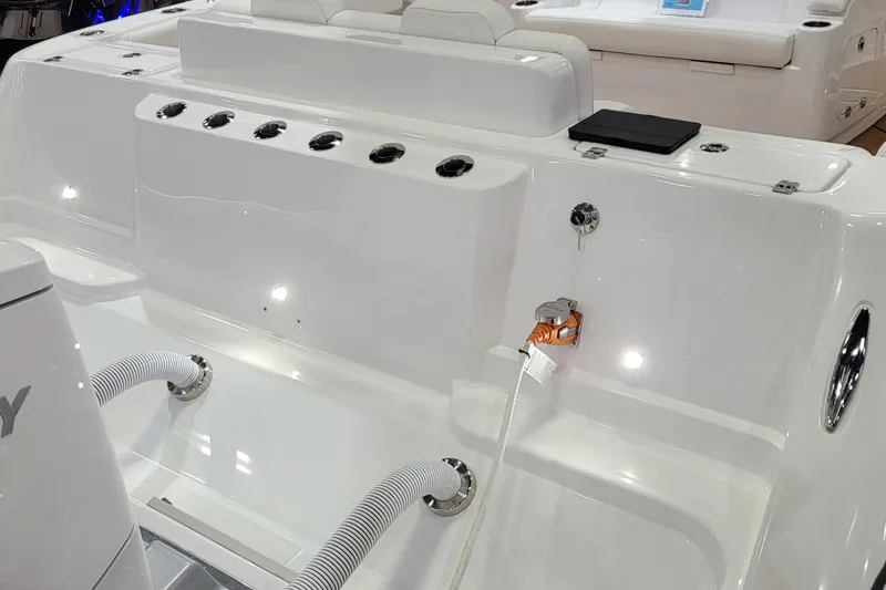 Slide: The Image of 2023 HCB 39 FT Speciale boat interior with seating and utility features. - 13