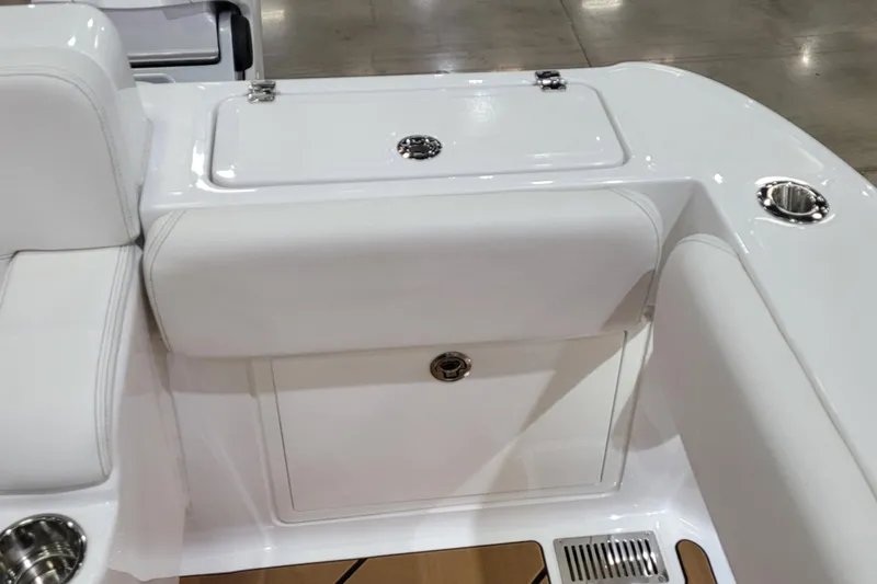 Slide: The Image of 2023 HCB 39 FT Speciale boat interior with white seating and storage compartments. - 15