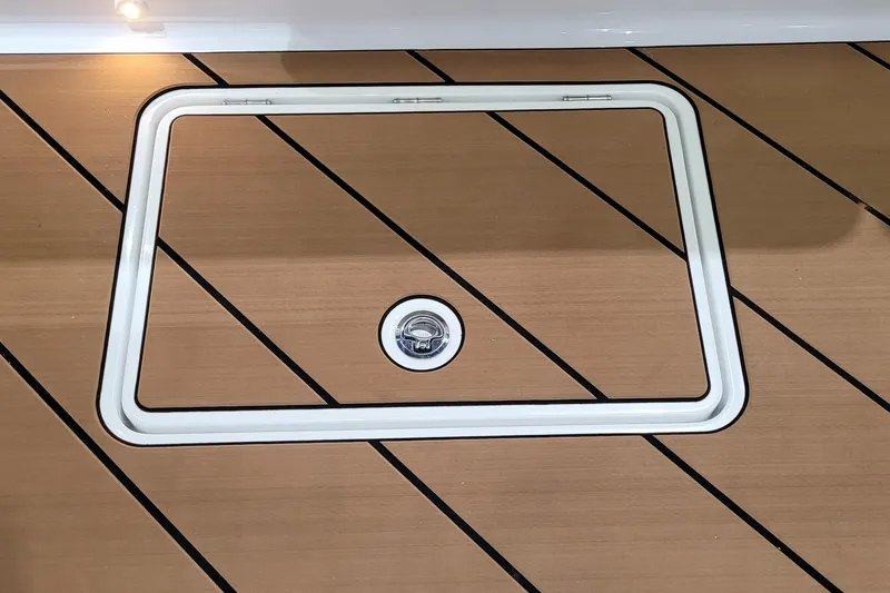 Slide: The Image of HCB 39 FT Speciale 2023 boat deck with hatch and circular handle. - 23