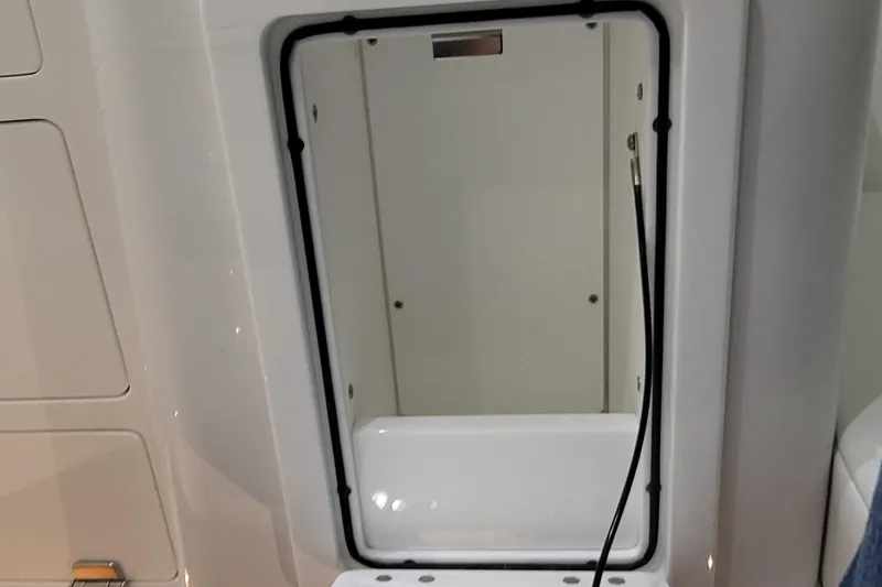 Slide: The Image of Open storage compartment on 2023 HCB 39 FT Speciale boat. - 28