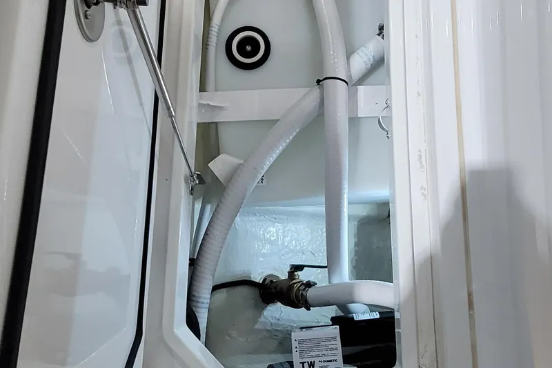 Slide: The Image of Interior view of 2023 HCB 39 FT Speciale boat showing plumbing and fittings. - 37