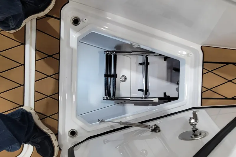 Slide: The Image of HCB 39 FT Speciale 2023 boat hatch with ladder, open on teak deck. - 38